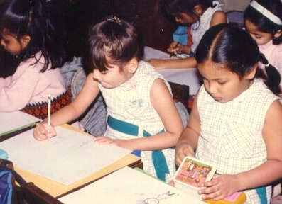 Gazal in a drawing class with her classmates